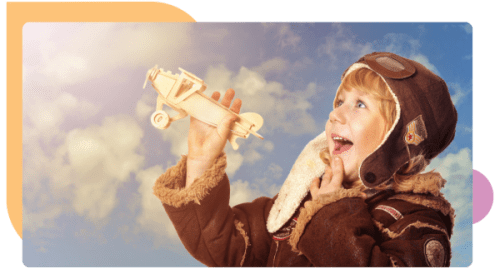 Child holding toy airplane symbolizing imagination and growth at ChildPilot
